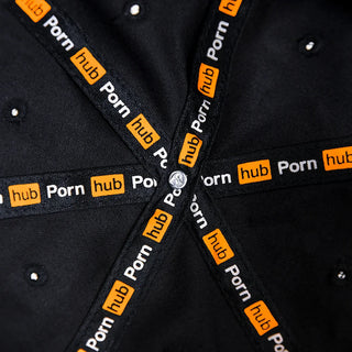 Pornhub Black Dad Cap adjustable strap with silver metal buckle and custom interior brand taping, close-up back view